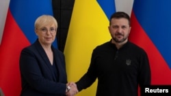 Ukraine's President Volodymyr Zelenskyy meets with Slovenian President Natasa Pirc Musar in Kyiv, Ukraine, June 28, 2024. (Ukrainian Presidential Press Service/Handout via Reuters)