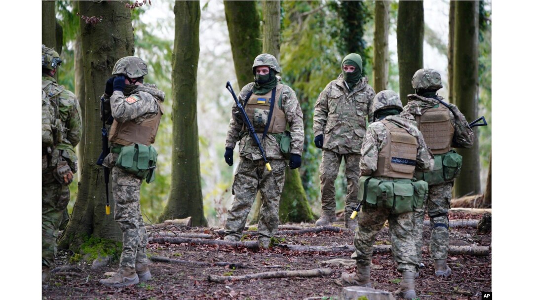 FILE - Ukrainian soldiers during training on Salisbury Plain in Wiltshire, Britain, where Australian Armed Forces are supporting the UK-led training of Ukrainian recruits, Feb. 1, 2023. (Ben Birchall/Pool via AP)