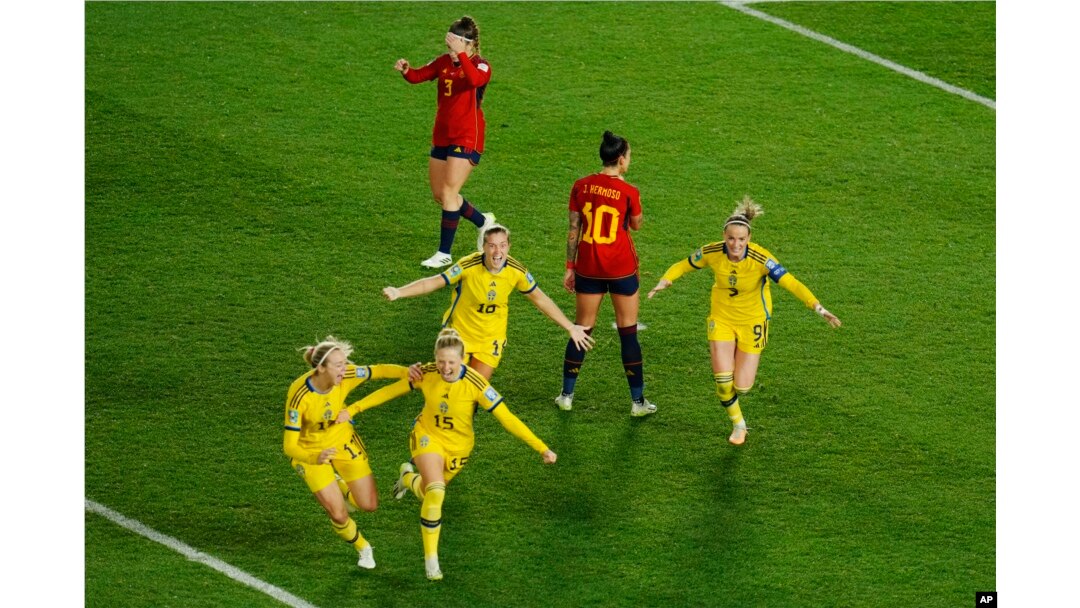 Sweden's Rebecka Blomqvist, second left, celebrates with teammates after scoring her side's first goal during the Women's World Cup semifinal soccer match between Sweden and Spain at Eden Park in Auckland, New Zealand, Aug. 15, 2023.