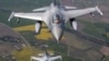 Фото для ілюстрації: португальські літаки F-16 патрулюють небо над країнами Балтії (AP Photo/Mindaugas Kulbis)