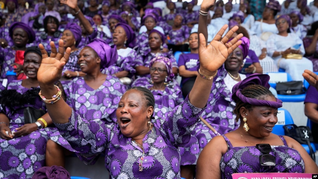 A women chants during the International Women's Day celebration at the Mobolaji Johnson Stadium in Lagos, Nigeria, March. 8, 2023.