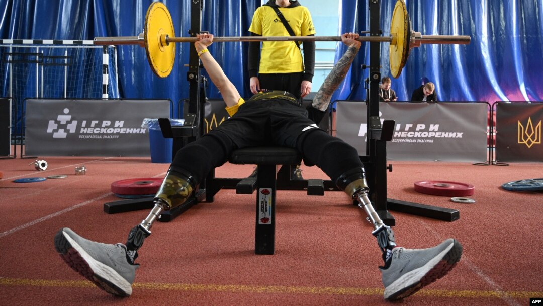 A weightlifter warms up during the qualifying round of the Ukrainian Invictus Games, in Lviv, Ukraine, on April 29, 2023. Qualifying competition winners will represent Ukraine at the Invictus Games in September in Dusseldorf, Germany.