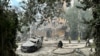 Rescuers work at the site of a Russian missile strike, amid Russia's attack on Ukraine, in Kharkiv, Ukraine, Aug. 6, 2024.