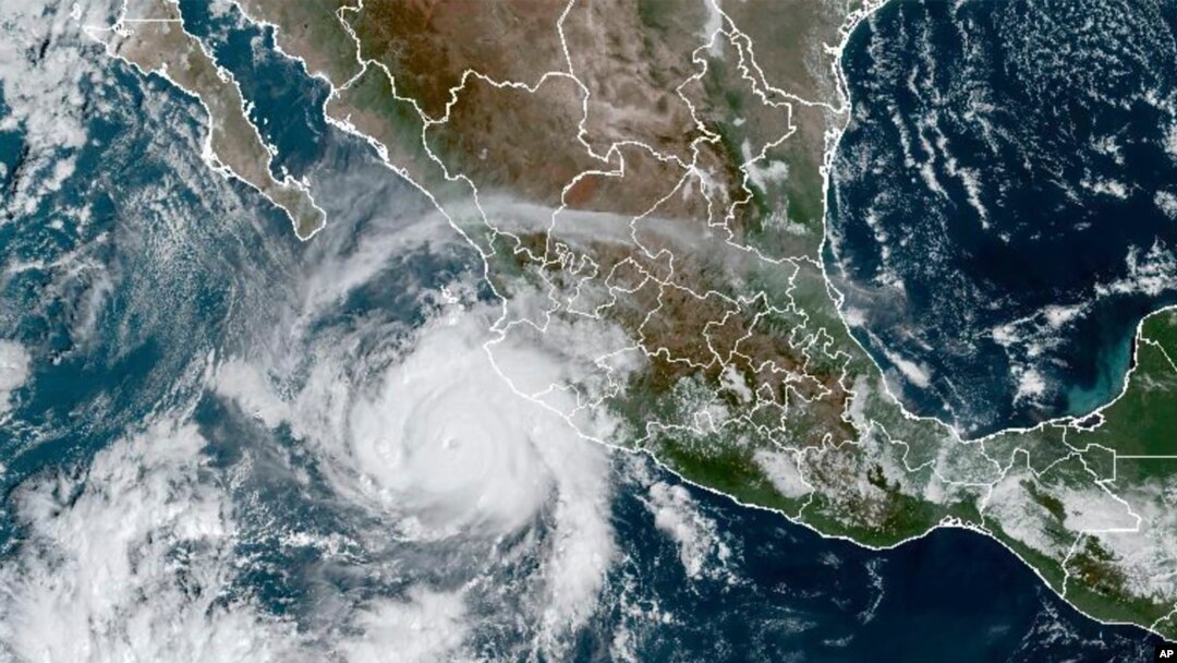This satellite image taken at 15:30 UTC and provided by NOAA shows Hurricane Roslyn approaching the Pacific coast of Mexico, Oct. 22, 2022.