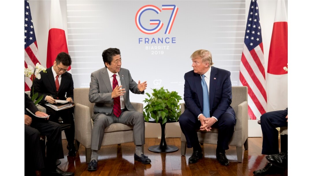 U.S President Donald Trump, right, and Japanese Prime Minister Shinzo Abe attend a bilateral meeting at the G-7 summit in Biarritz, France, Aug. 25, 2019.