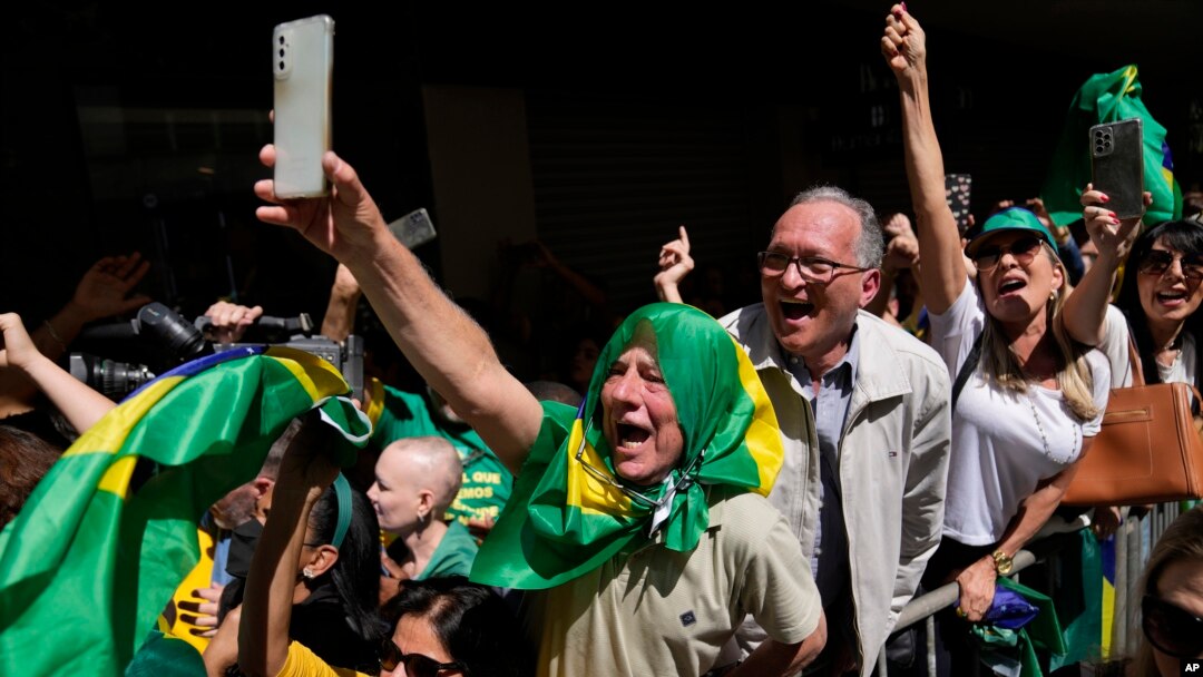 Supporters of Brazilian President Jair Bolsonaro attend his reelection campaign rally in Juiz de Fora, Minas Gerais state, Brazil, Aug. 16, 2022. 