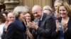 Conservative Party members of Parliament applaud Theresa May, Britain's incoming prime minister, in London, July 11, 2016. 