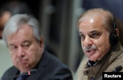 FILE - Pakistan's Prime Minister Shehbaz Sharif and United Nations Secretary-General Antonio Guterres attend a summit at the United Nations, in Geneva, Switzerland, Jan. 9, 2023.