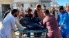 A man injured by the Afghan forces shelling is brought to hospital for treatment in Chaman, southwestern Pakistan along the Afghan border, Dec. 15, 2022. 