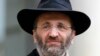Chief Rabbi of France Gilles Bernheim leaves after a meeting at the Elysee Palace in Paris December 16, 2011.