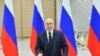 Russian President Vladimir Putin delivers a speech as he visits the Vostochny Cosmodrome in Amur Region, Russia, April 12, 2022. (Sputnik/Evgeny Biyatov/Kremlin via Reuters)