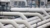 FILE - Pipes are pictured at a gas compressor station in Mallnow, Germany, Nov. 1, 2021.
