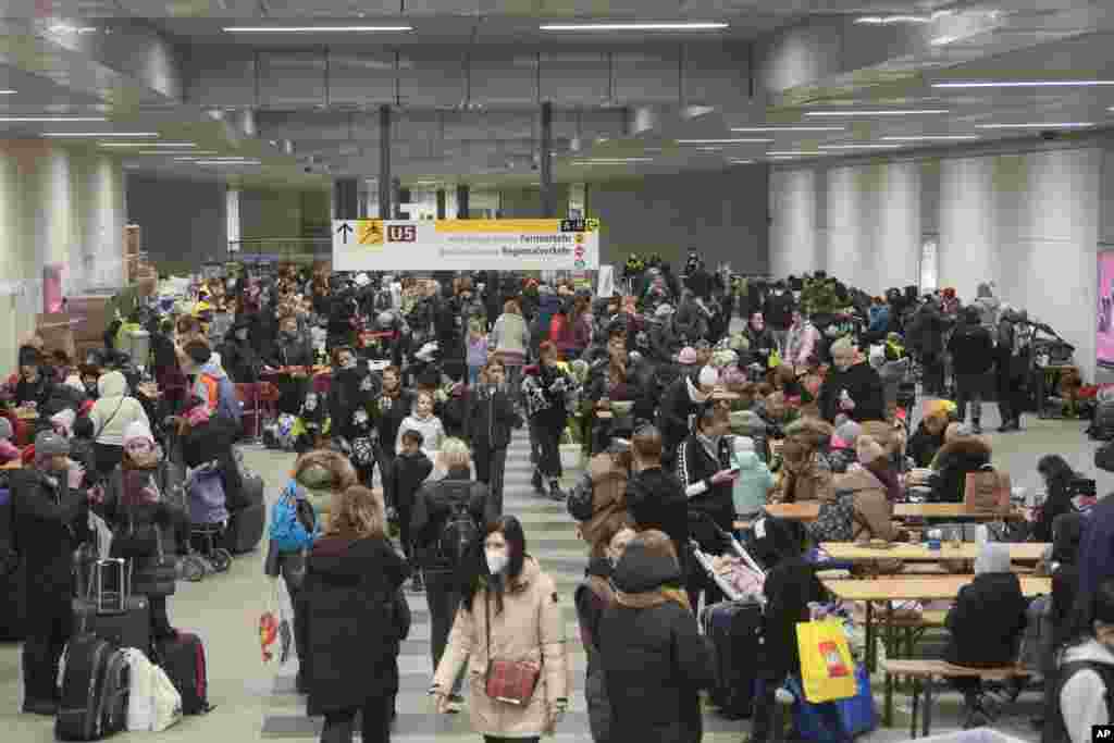 Refugees rest in a subway hall after fleeing from the Ukraine at the main train station in Berlin, Germany, March 14, 2022. Germany's Interior Ministry said that it has so far registered 146,998 refugees from Ukraine coming to the country, but the real number may differ if people didn't register or moved on to another country.