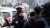 Croatian police officers secure a perimeter around the border crossing Maljevac, between Bosnia and Croatia, Dec. 27, 2022. Some 50 ethnic Chechens from Russia have reached Bosnia over the past week in search for a jumping-off point for the European Union.