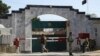 FILE - Security stands guard outside the Pakistan Embassy in Kabul, Afghanistan, Nov. 4, 2019.