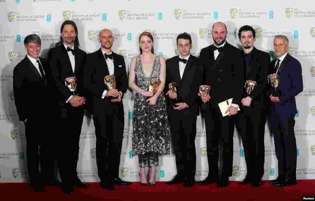 The team behind 'La La Land" hold their awards for Best Film at the British Academy of Film and Television Awards (BAFTA) at the Royal Albert Hall in London, Britain, Feb.ruary 12, 2017.