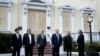 President Donald Trump stands outside St. John's Church, June 1, 2020, in Washington. Standing with Trump are Mark Esper, from left, William Barr, Robert O'Brien, Kayleigh McEnany and Mark Meadows.
