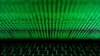 FILE PHOTO: A computer keyboard lit by a displayed cyber code is seen in this illustration picture