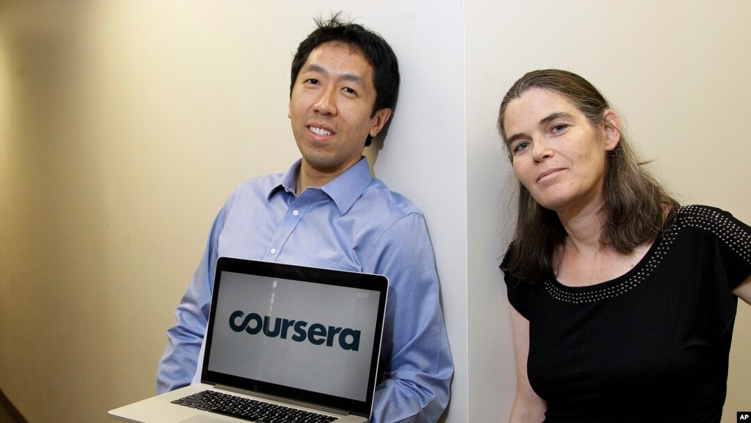 Andrew Ng and Daphne Koller are Stanford University computer science professors who started Coursera. They posed for a photo in 2012. In March 2021, the company will offer shares for sale on the New York Stock Exchange. (AP Photo/Jeff Chiu)