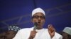 Muhammadu Buhari, former military ruler and Presidential candidate for the Congress for Progressive Change (CPC), speaks during the flag-off of the presidential campaign at Mapo square, Ibadan, south-west Nigeria, March 14, 2011. (Reuters Image)