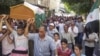 Residents carry the coffin of Muhammad Mousa, whom protesters say was killed by forces loyal to Syria's President Bashar al-Assad, during his funeral in Yabroud near Damascus July 21, 2012.
