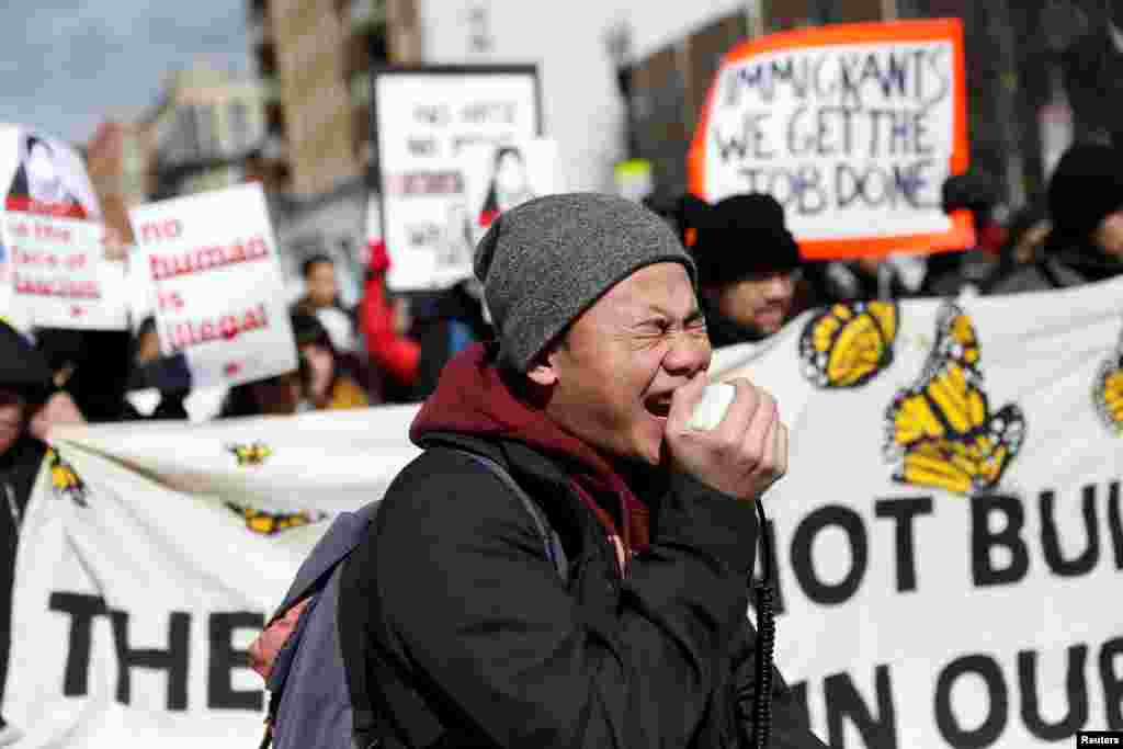 Demonstrators march during the "Day Without Immigrants" protest in Washington, D.C.