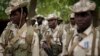 FILE - Chadian troops participate in the closing ceremony of operation Flintlock in an army base in N'djamena, Chad, Monday, March 9, 2015.