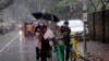 People of a slum relocate as a precautionary measure against cyclone in Mumbai, India, June 3, 2020.