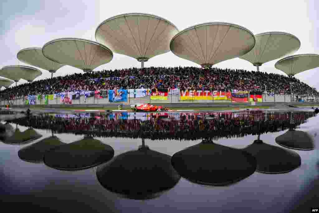 Ferrari's German driver Sebastian Vettel drives during the Formula One Chinese Grand Prix in Shanghai.