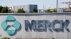 FILE - Signage is seen at the corporate headquarters of the U.S. pharmaceutical company Merck in Kenilworth, N.J., May 1, 2018. 