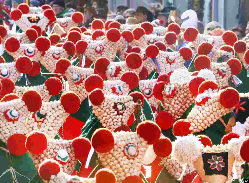 About 2,000 jesters called Schuttige take part in the traditional Schuttige carnival parade in the city center of Elzach, Germany.
