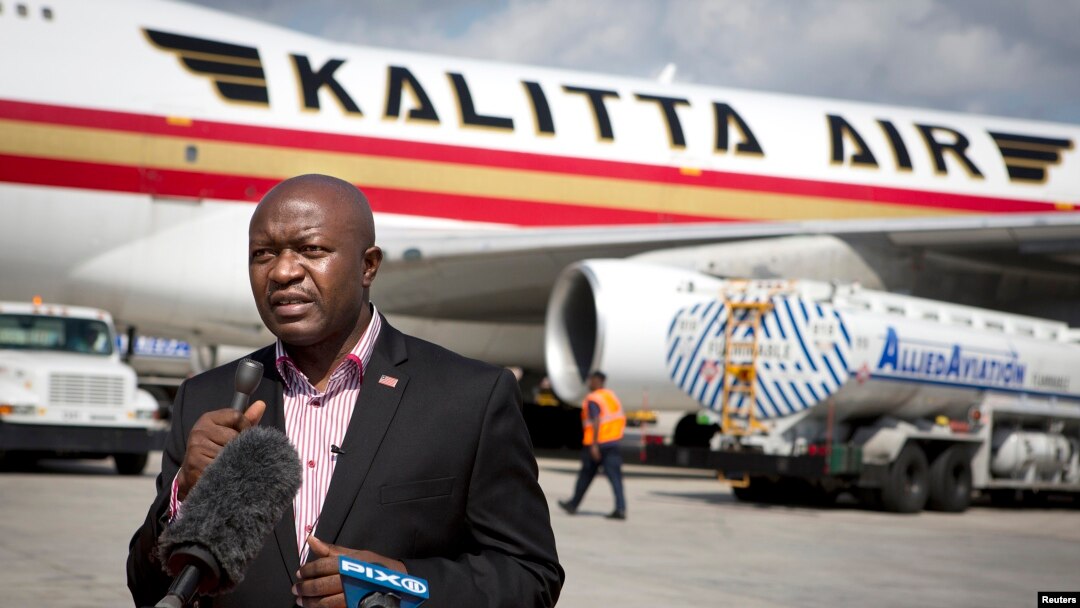 FILE - Augustine Ngafuan, former Minister of Foreign Affairs of Liberia, speaks to the media. Ngafuan also served as finance minister under President Ellen Johnson Sirleaf,