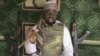 This file image taken from video posted by Boko Haram sympathizers made available on Wednesday, Jan. 10, 2012 shows Imam Abubakar Shekau, the leader of the radical Islamist sect Boko Haram.