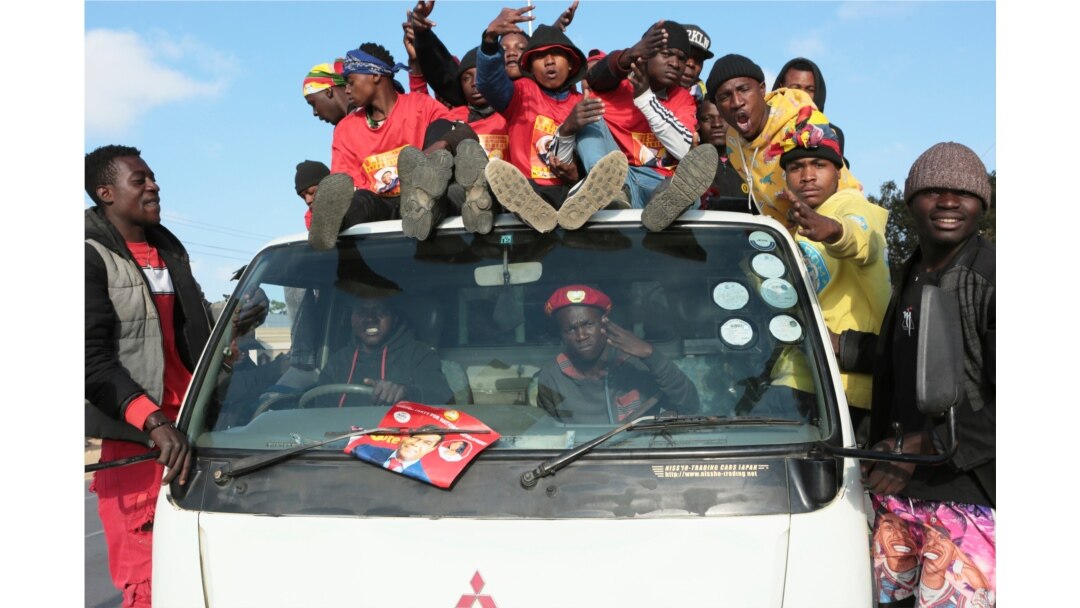 Supporters of Zambian opposition leader Hakainde Hichilema celebrate on the streets of Lusaka, Zambia, Aug, 16, 2021. Hichilema has won the southern African country's presidency after taking more than 50% of the vote.