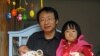 中国青年政治学院副教授杨支柱和他两个孩子