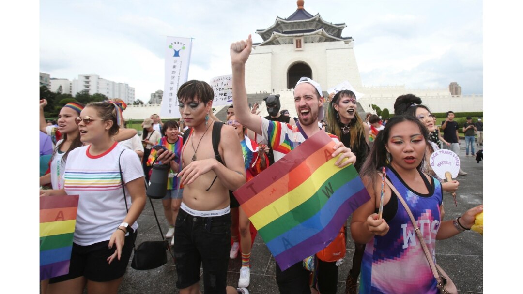 Participants march during the "Taiwan Pride March for the World!" at Liberty Square at the CKS Memorial Hall in Taipei, Taiwan, June 28, 2020.