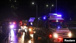 Rows of ambulances are seen outside the Calicut International Airport where a passenger plane crashed after it overshot the runway in Karipur, in the southern state of Kerala, India, August 7, 2020.