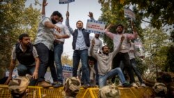VOA Asia - India farmers' position firmly planted