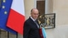 FILE - French Interior Minister Bernard Cazeneuve leaves the Elysee Palace following a weekly Cabinet meeting in Paris, May 2014.