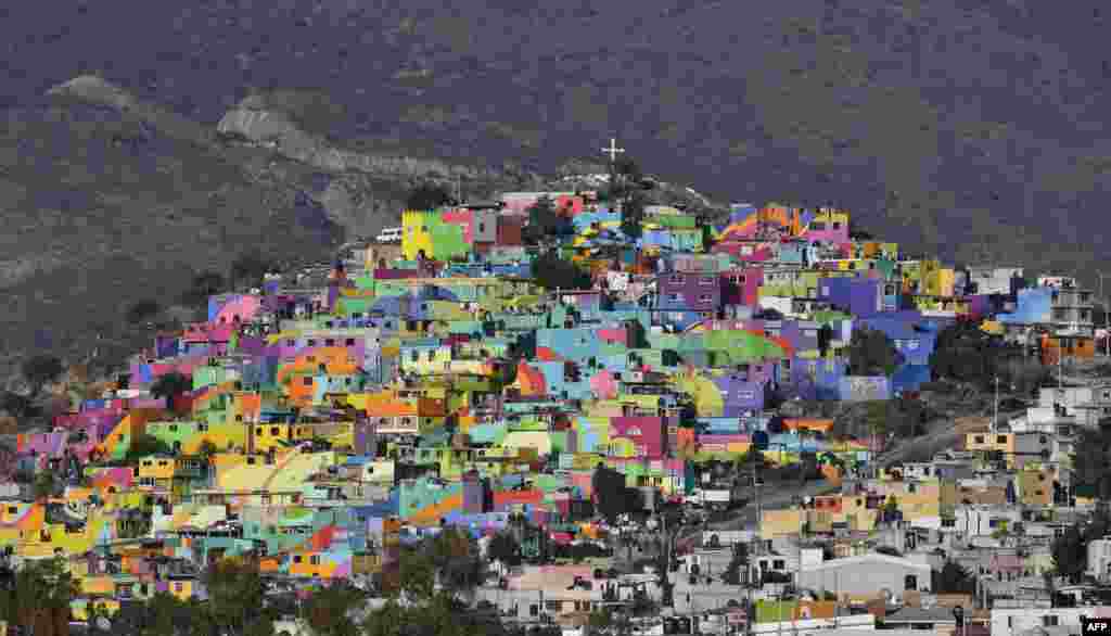 View of houses on a hill painted with vivid colors in Pachuca, Hidalgo, Mexico, April 4, 2017.