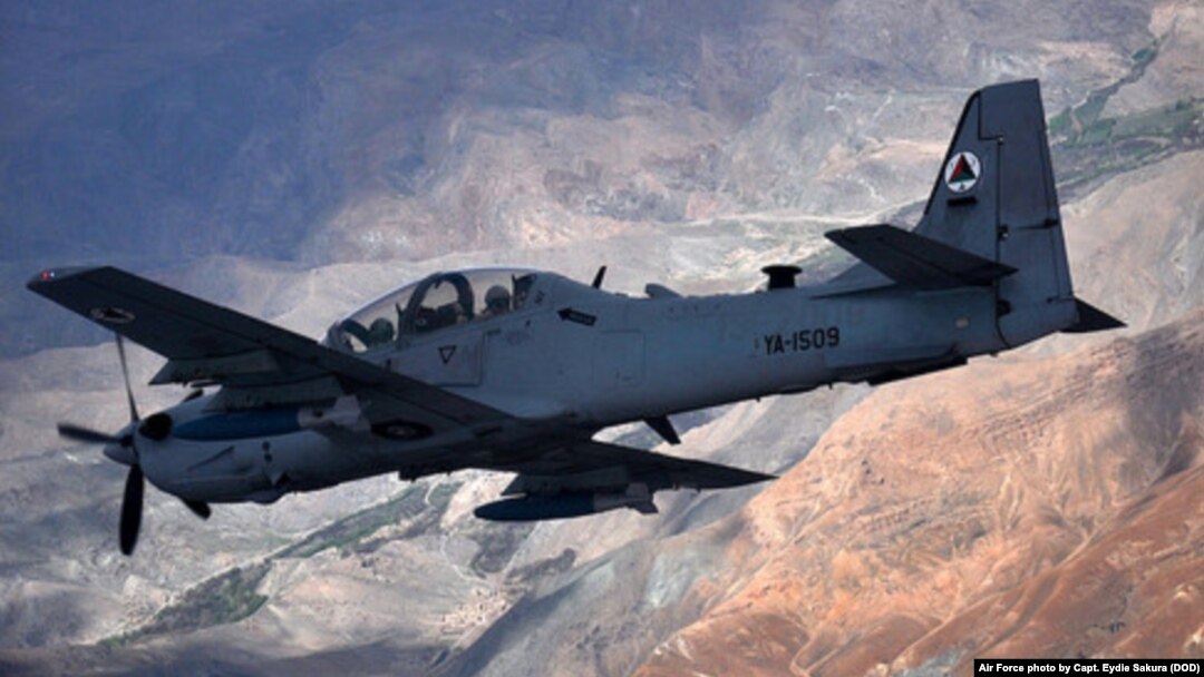 FILE - An A-29 Super Tucano aircraft flies over Afghanistan during a training mission, April 6, 2016. 