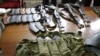  Some of the arms and ammunition recovered by police displayed in Nairobi, Kenya, September 14, 2012. 