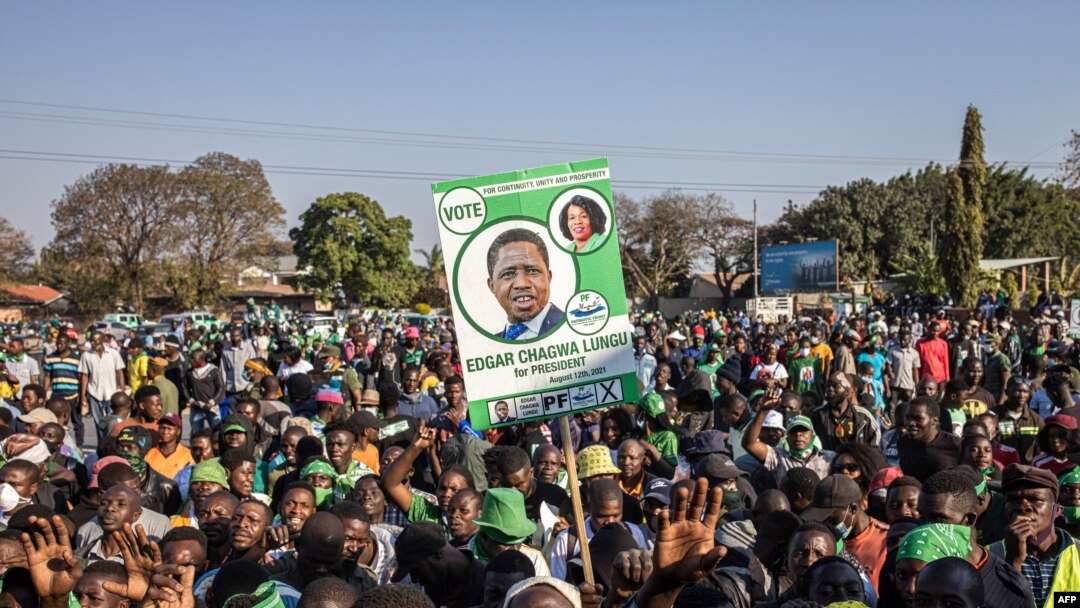 Supporters of the leader of the ruling Zambia Patriotic Front, incumbent president and candidate Edgar Lungu gather in Lusaka, on Aug. 11, 2021 for a virtual closing rally ahead of the general election.