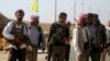 Şervanên Êzîdî ku tev li YPG bûne bi hevre xuya dibin