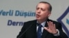 Turkey's President Recep Tayyip Erdogan addresses supporters in Ankara, Turkey, May 12, 2016. Erdogan is accusing Brussels of double standards and warned he is ready to freeze a key migrant readmission agreement with the EU.