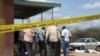 Kenyan security forces secure the African Inland Church after an attack in Kenya's northern town of Garissa, July 1, 2012. 