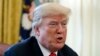 FILE - President Donald Trump speaks with reporters at the White House in Washington, Dec. 22, 2017. Trump will deliver his State of the Union address Jan. 30, 2018.