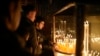 Faithful pray at the Church of the Nativity, traditionally believed to be the birthplace of Jesus, in the West Bank city of Bethlehem, Dec. 24, 2024. 