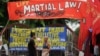Filipino activists protest near the Malacanang Presidential Palace in Manila, Philippines, July 20, 2017, against Philippine President Rodrigo Duterte's proposed extension of martial law in the whole of Mindanao island until the end of the year.
