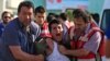 Turkish police arrest a protester chanting slogans in Istanbul after he and others tried to stage a march to denounce the deaths of a Monday explosion in the Turkish town of Suruc near the Syrian border, July 21, 2015.